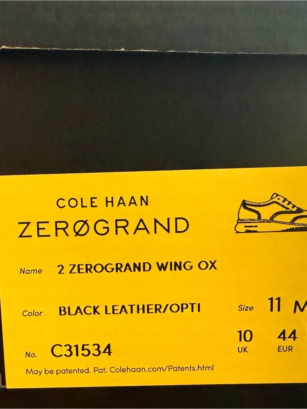 Cole Haan Black Leather Wingtip Oxfords with White Sole